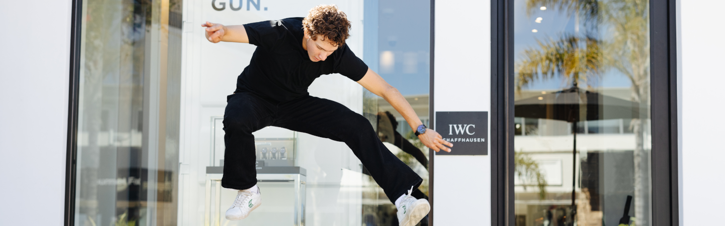 Jagger Eaton Skates with an IWC Watch on His Wrist